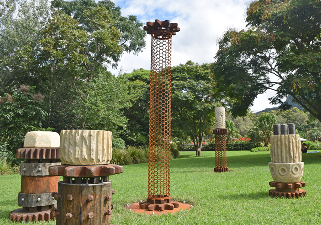 Michael Purdy's sculpture 'Steel City' featuring five columns of various heights made from metal, stone and wood